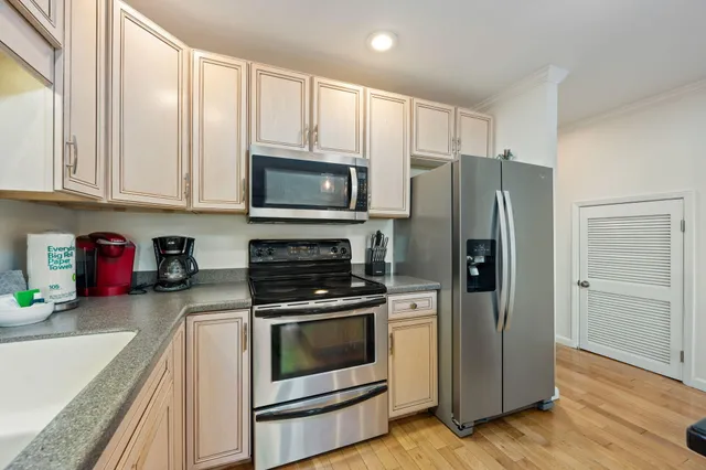 a bathroom with a shower and a toilet