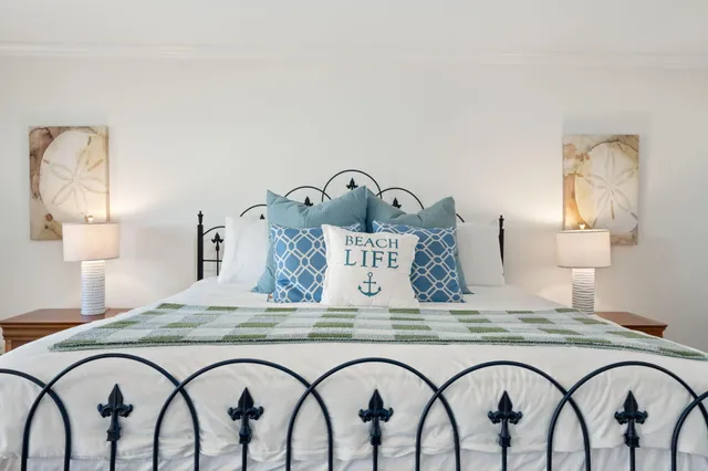 a bathroom with a sink toilet and a mirror