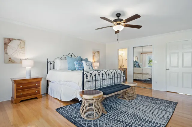 a bedroom with furniture and a window