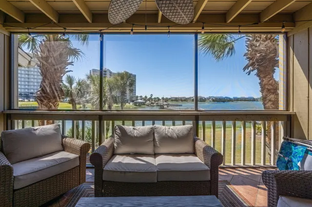 a kitchen with stainless steel appliances granite countertop a sink a stove and a microwave