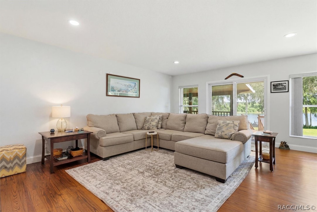 4099 West Ridge Court Dunnellon, FL 34433 - Photo 24 of 49 More views of great room and doors to porch. Top quality everything for added comfort, efficiency and value! All newer ceilings, walls, recessed lights and windows.