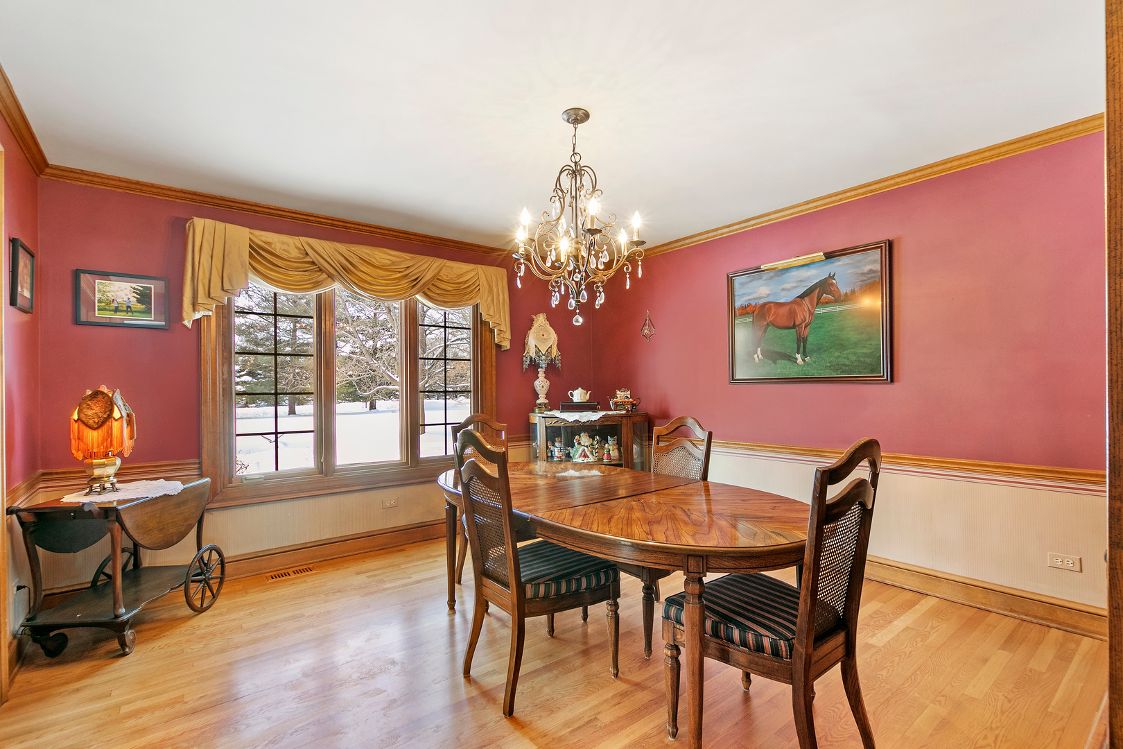 7 Cross Timber Road Barrington Hills, IL 60010 - Photo 8 of 55 a dining room with furniture a chandelier and wooden floor
