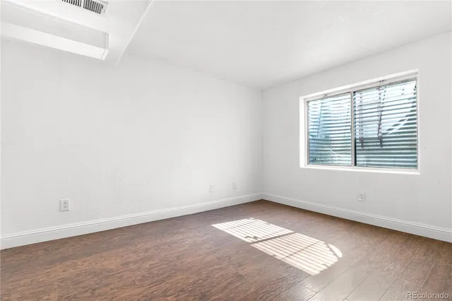 an empty room with a window