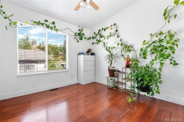 wooden floor in a room with a window
