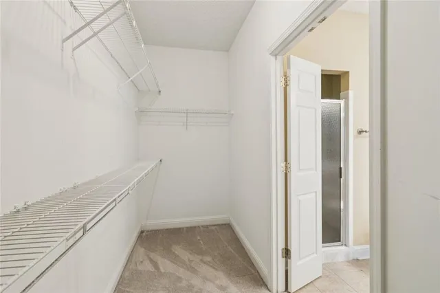 a view of a porch with furniture and garden