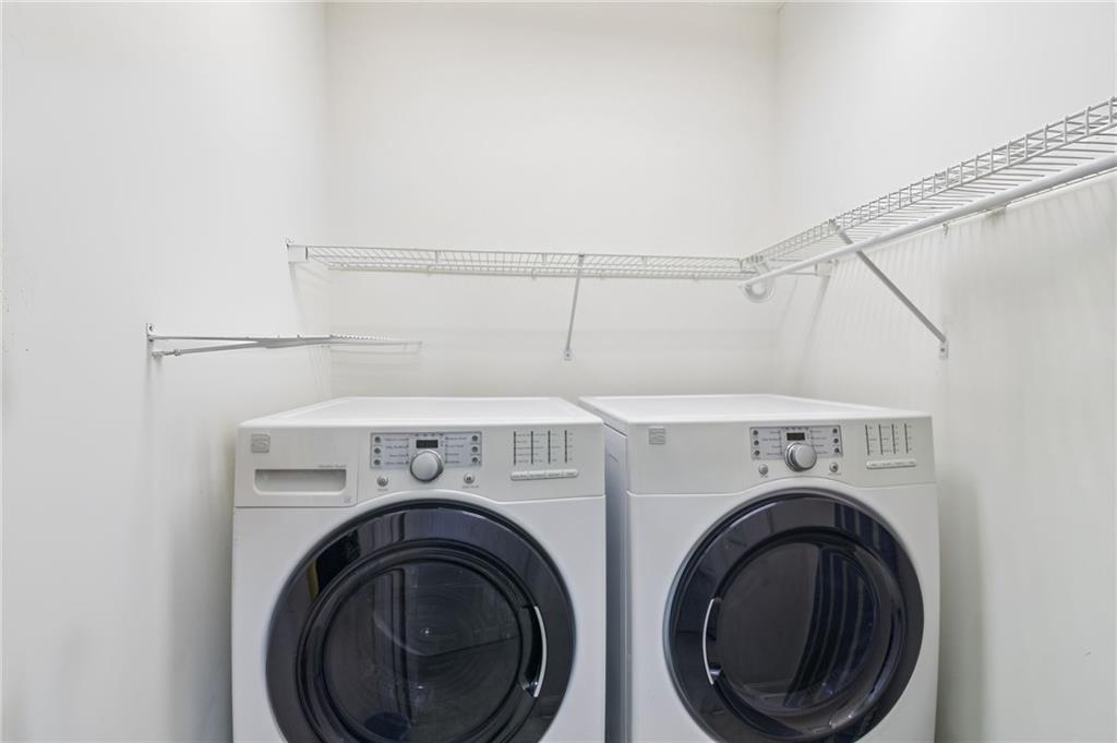 2530 Rosehill Circle Lithia Springs, GA 30122 - Photo 30 of 34 a utility room with dryer and washer