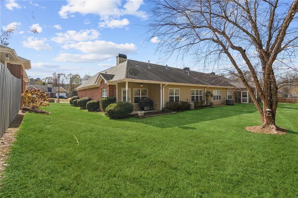 2530 Rosehill Circle Lithia Springs, GA 30122 - Photo 33 of 34 a front view of a house with garden