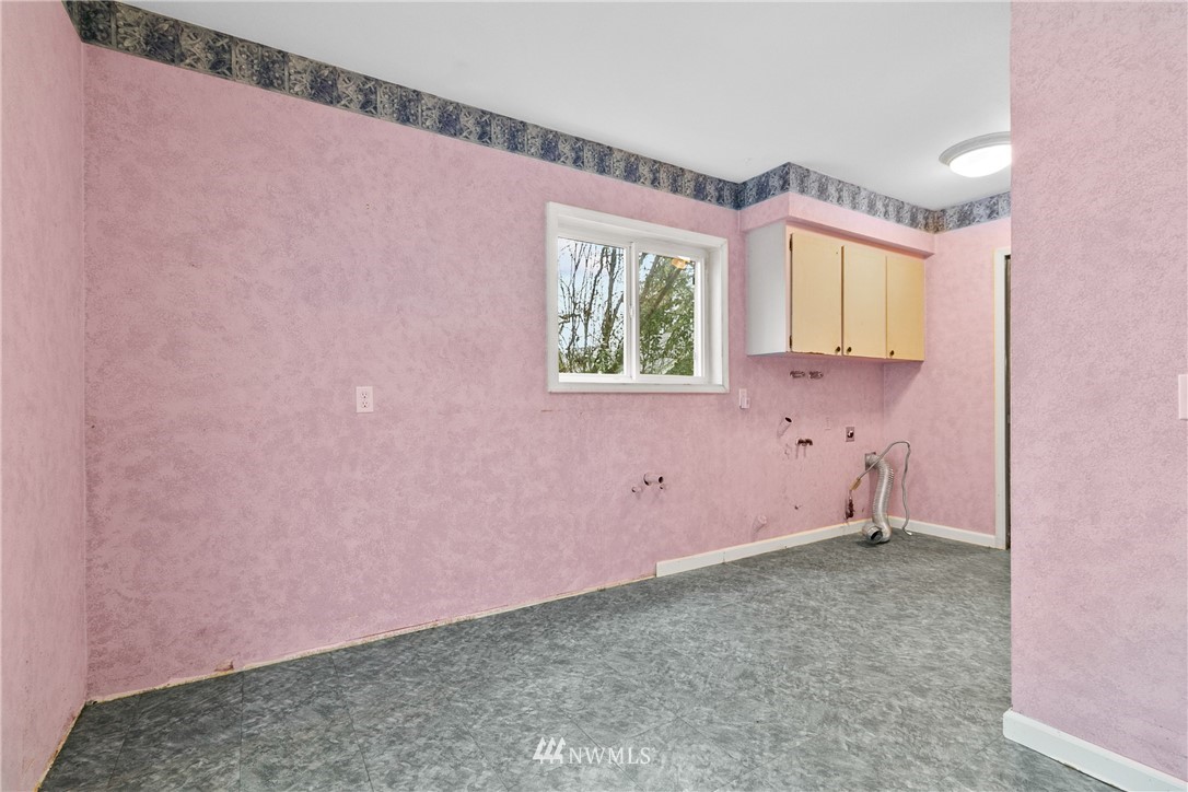519 Quince Street Northeast Olympia, WA 98506 - Photo 15 of 39 a bathroom with a sink and a mirror