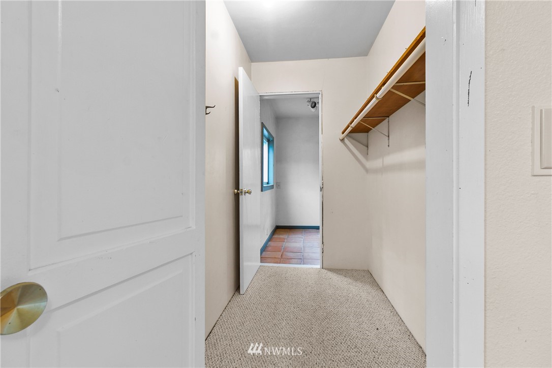 519 Quince Street Northeast Olympia, WA 98506 - Photo 17 of 39 a view of a hallway with wooden floor and staircase
