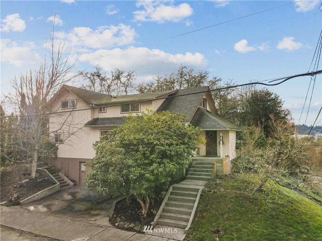 519 Quince Street Northeast Olympia, WA 98506 - Photo 2 of 39 a view of a house with a yard