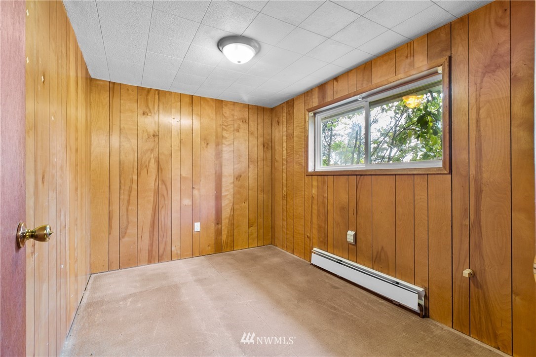 519 Quince Street Northeast Olympia, WA 98506 - Photo 6 of 39 a view of a room with a large window and doors