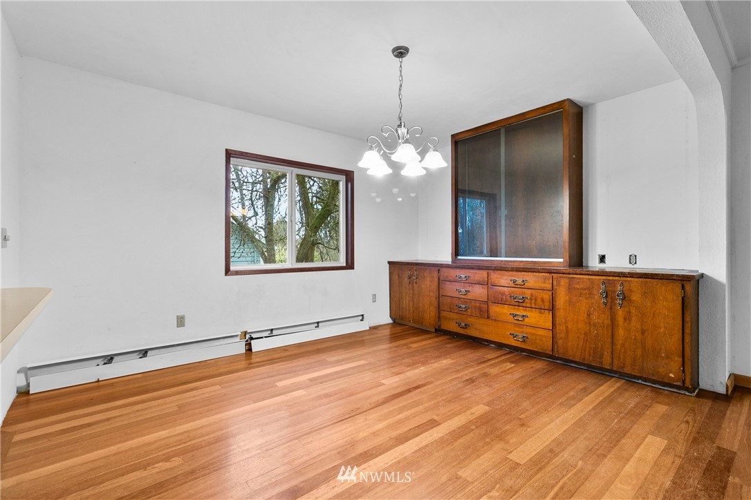 519 Quince Street Northeast Olympia, WA 98506 - Photo 10 of 39 a view of a room with wooden floor and window