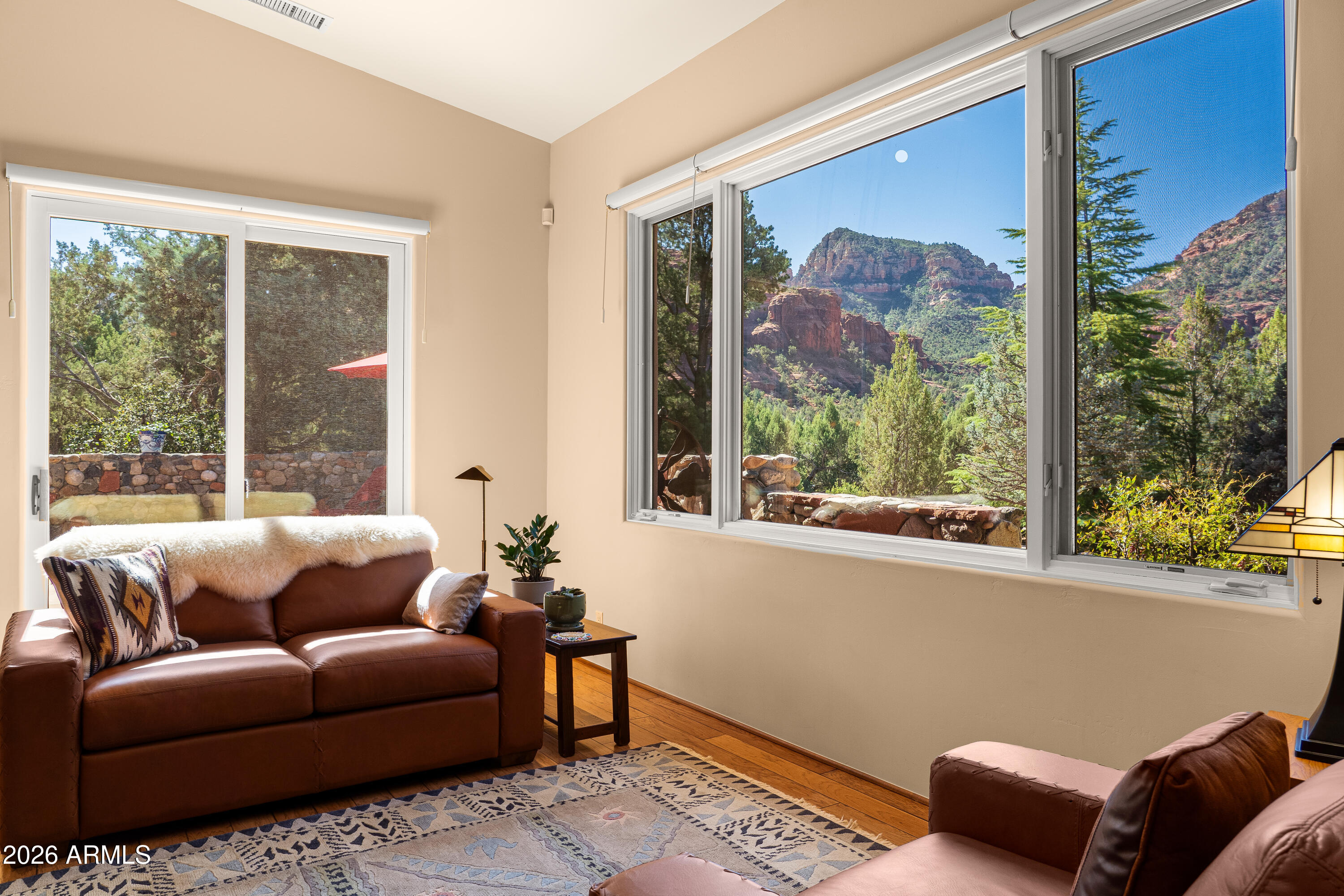 190 Morgan Road Sedona, AZ 86336 - Photo 24 of 51 a living room with furniture and a large window