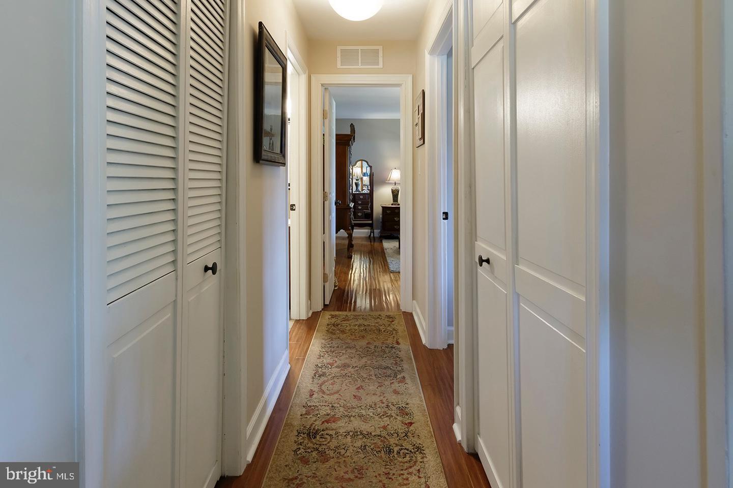 3408 B Neils Court Mount Laurel, NJ 08054 - Photo 5 of 9 a view of a hallway with a livingroom and a bathroom with sink