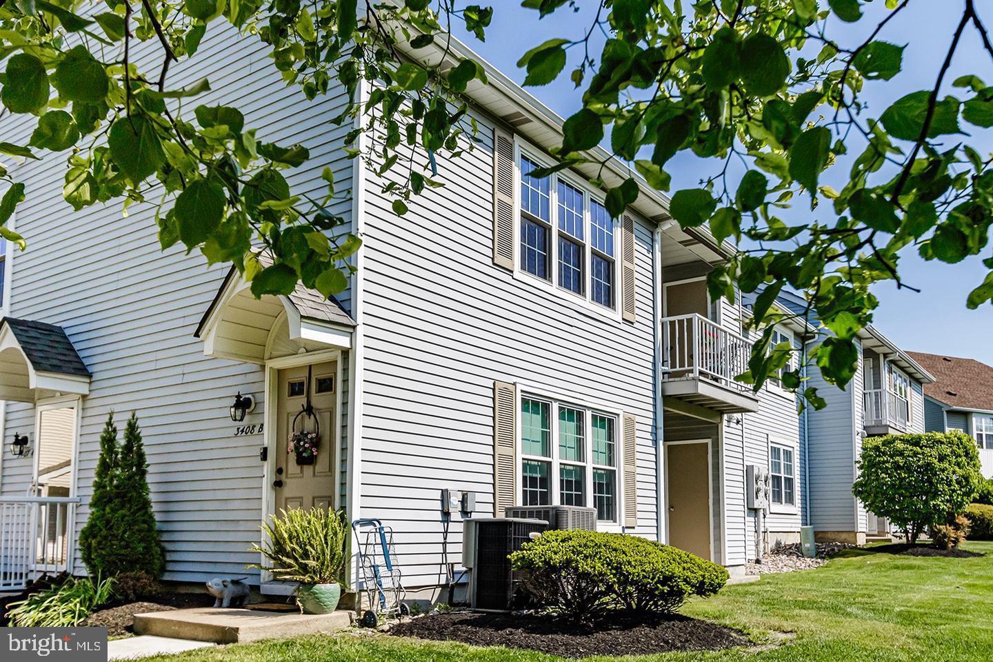 3408 B Neils Court Mount Laurel, NJ 08054 - Photo 8 of 9 a view of a house with a yard and plants