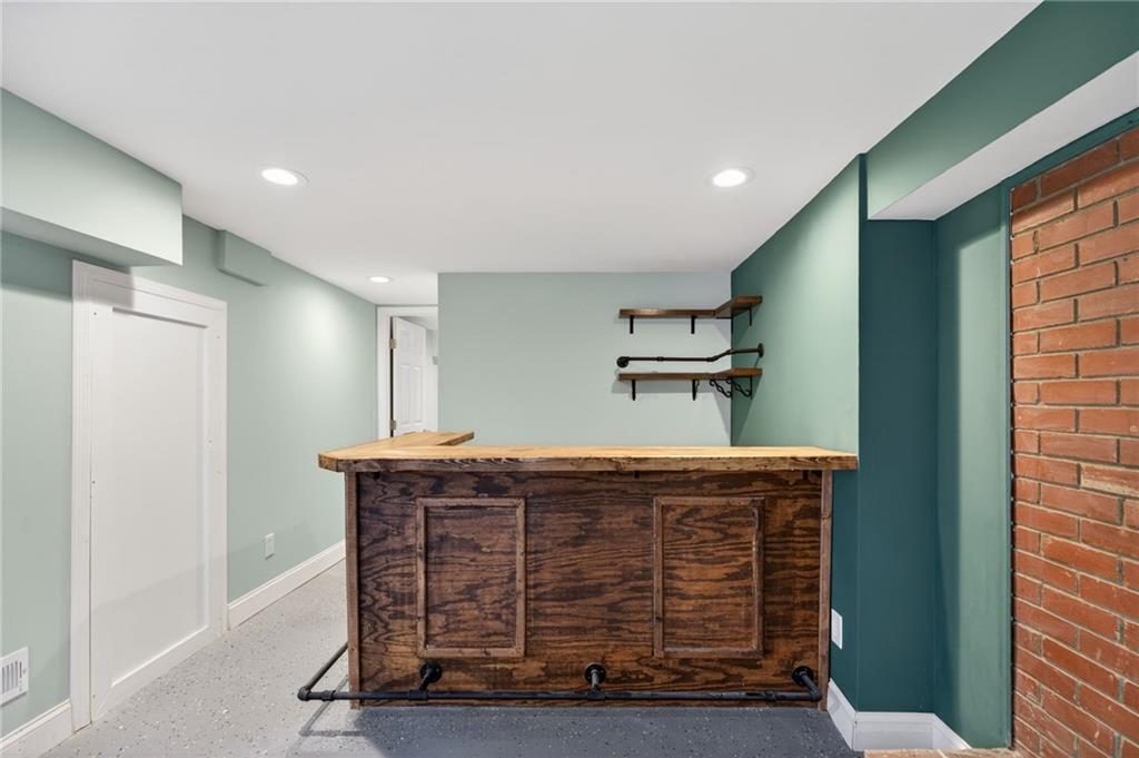 256 Astin Creek Road Villa Rica, GA 30180 - Photo 22 of 38 a room with a table and chairs