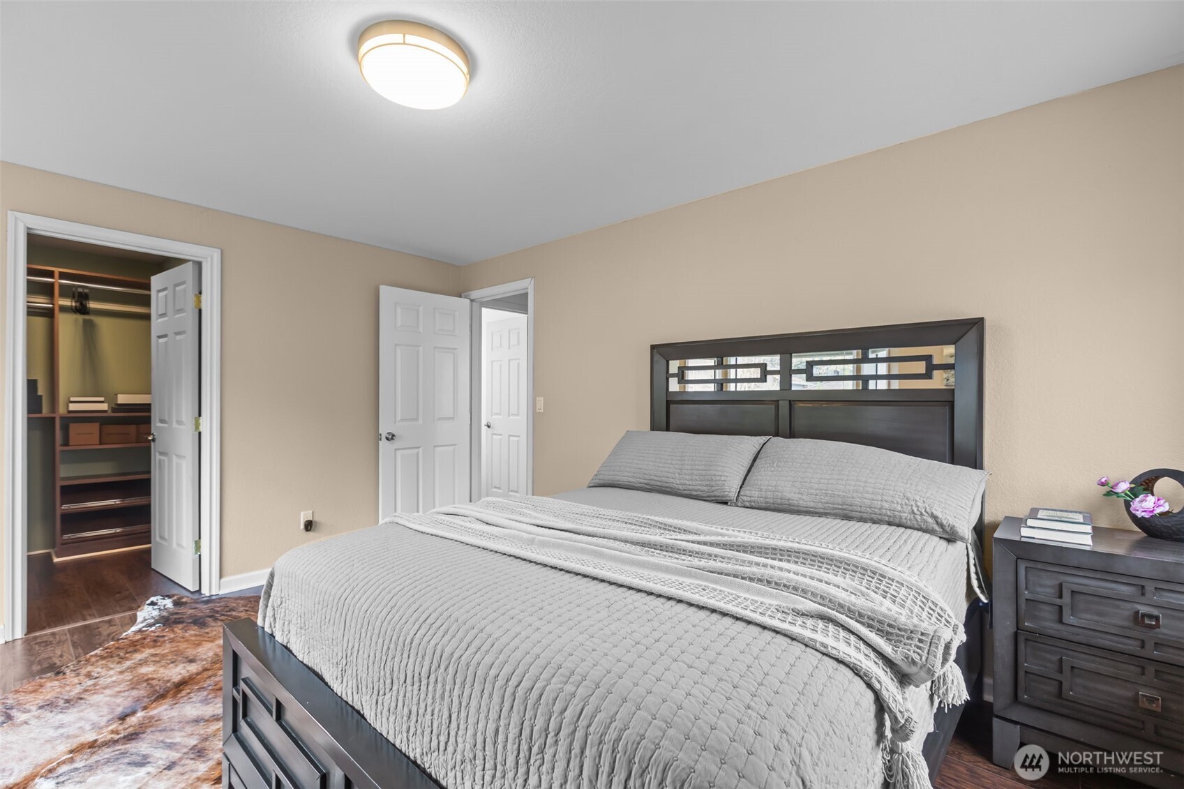1073 Southwest 326th Street Federal Way, WA 98023 - Photo 13 of 31 a bedroom with a bed and cabinets