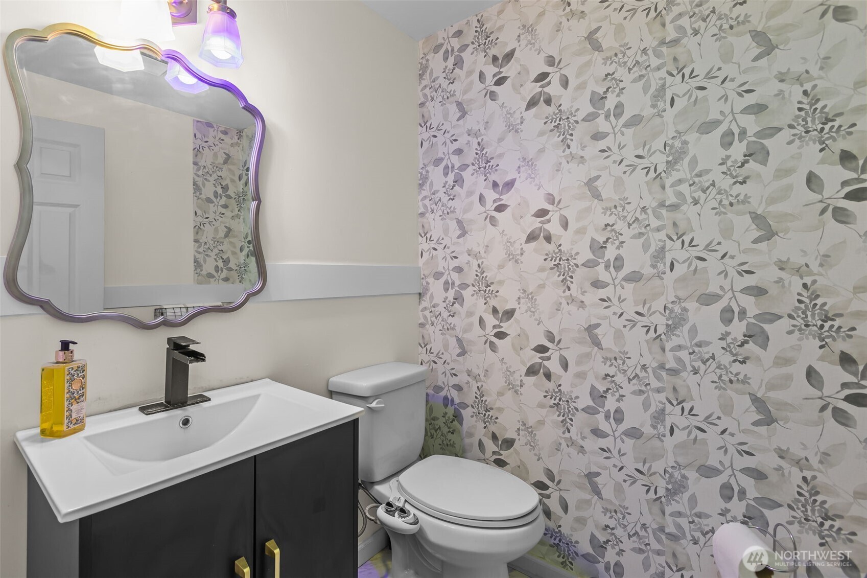 1073 Southwest 326th Street Federal Way, WA 98023 - Photo 19 of 31 a bathroom with a toilet sink and mirror