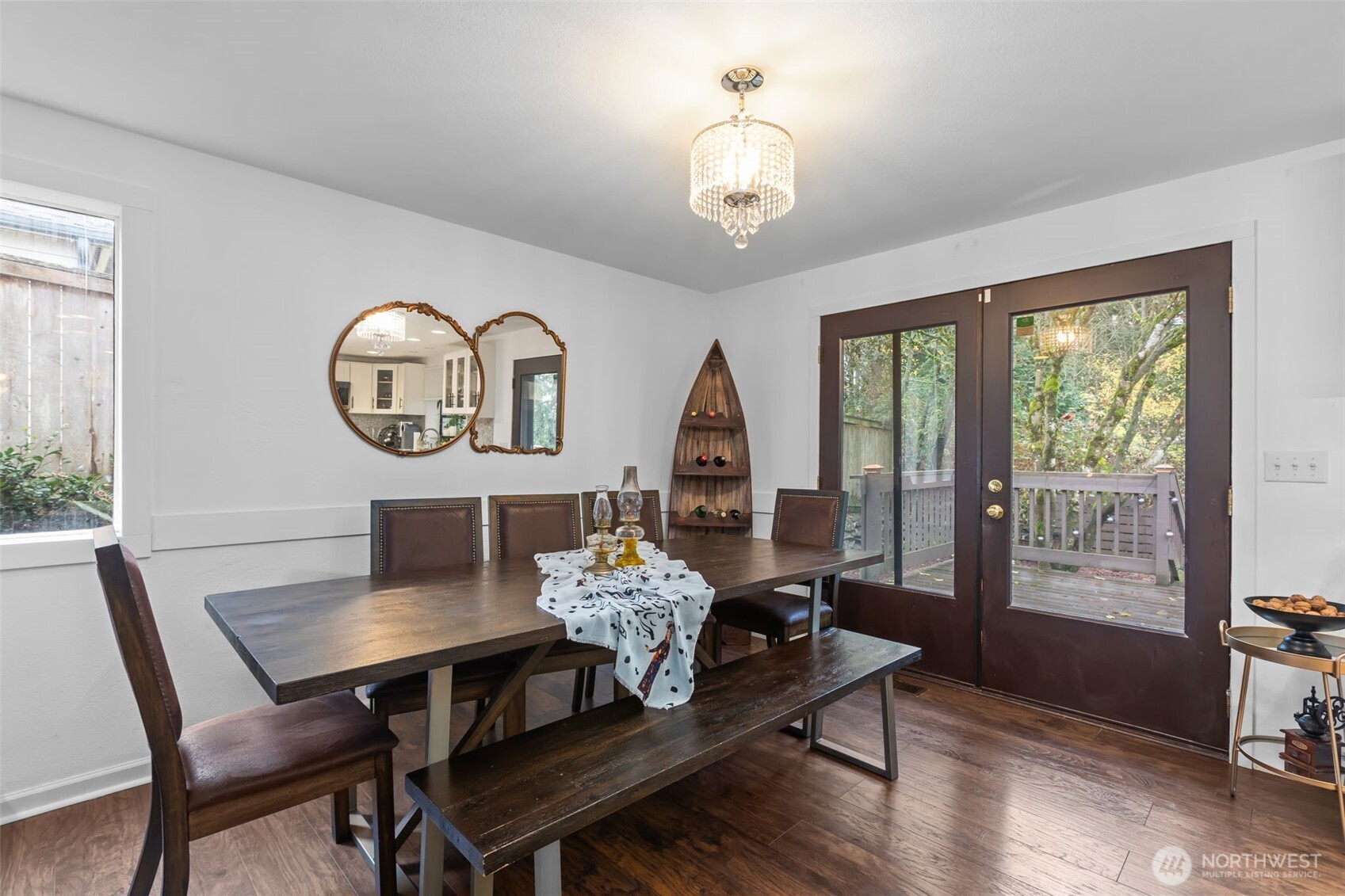 1073 Southwest 326th Street Federal Way, WA 98023 - Photo 3 of 31 a view of a dining room with furniture window and wooden floor