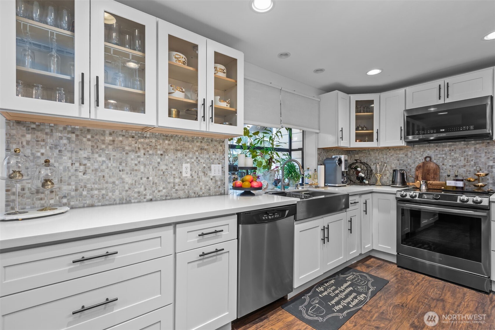 1073 Southwest 326th Street Federal Way, WA 98023 - Photo 5 of 31 a kitchen with stainless steel appliances granite countertop a sink and cabinets