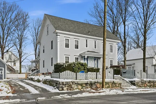 a front view of a building with street view