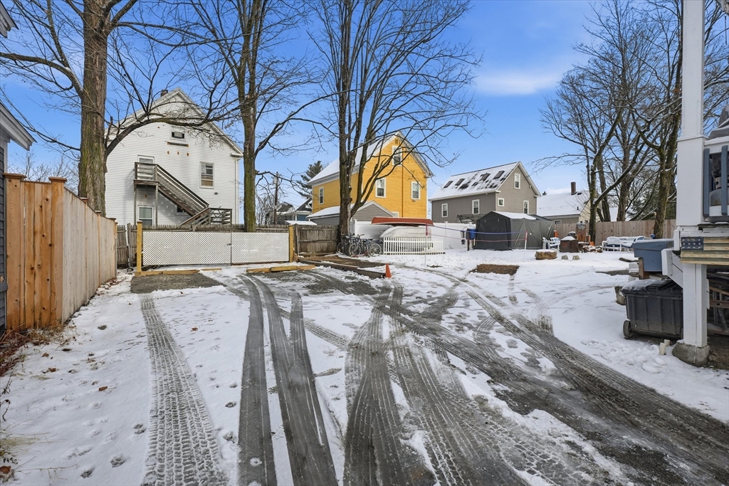 30-32 Walnut Street Maynard, MA 01754 - Photo 30 of 38 a view of multiple house with large trees