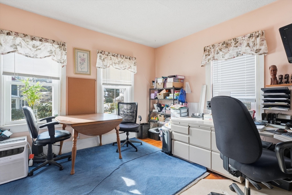 30-32 Walnut Street Maynard, MA 01754 - Photo 10 of 38 a view of a workspace with furniture and a workspace