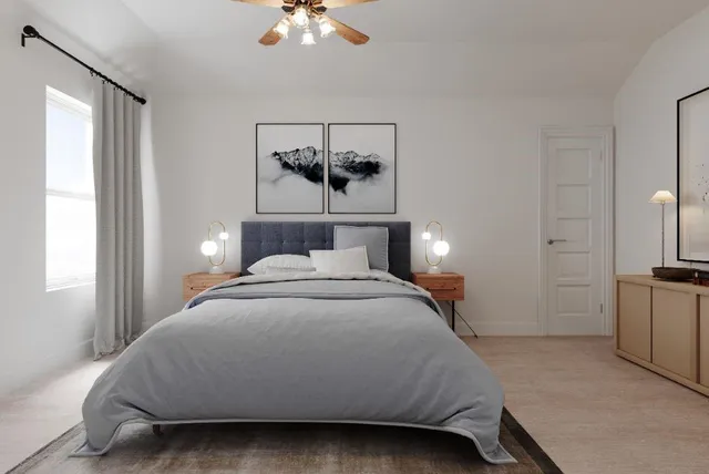 a view of a patio with table and chairs under an umbrella