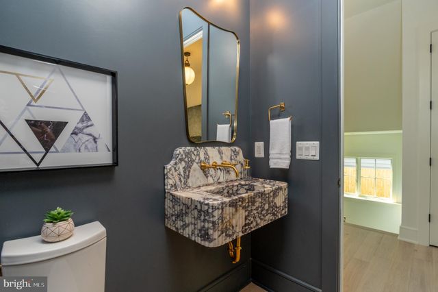 a close view of a sink and a kitchen
