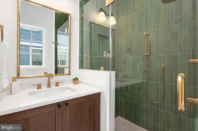 a view of a dining room with furniture wooden floor and chandelier