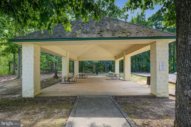 a house with trees in the background