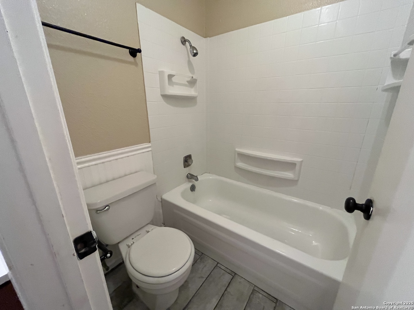 6522 Ridge Willow Drive San Antonio, TX 78233 - Photo 29 of 42 a bathroom with a granite countertop toilet a sink and bathtub