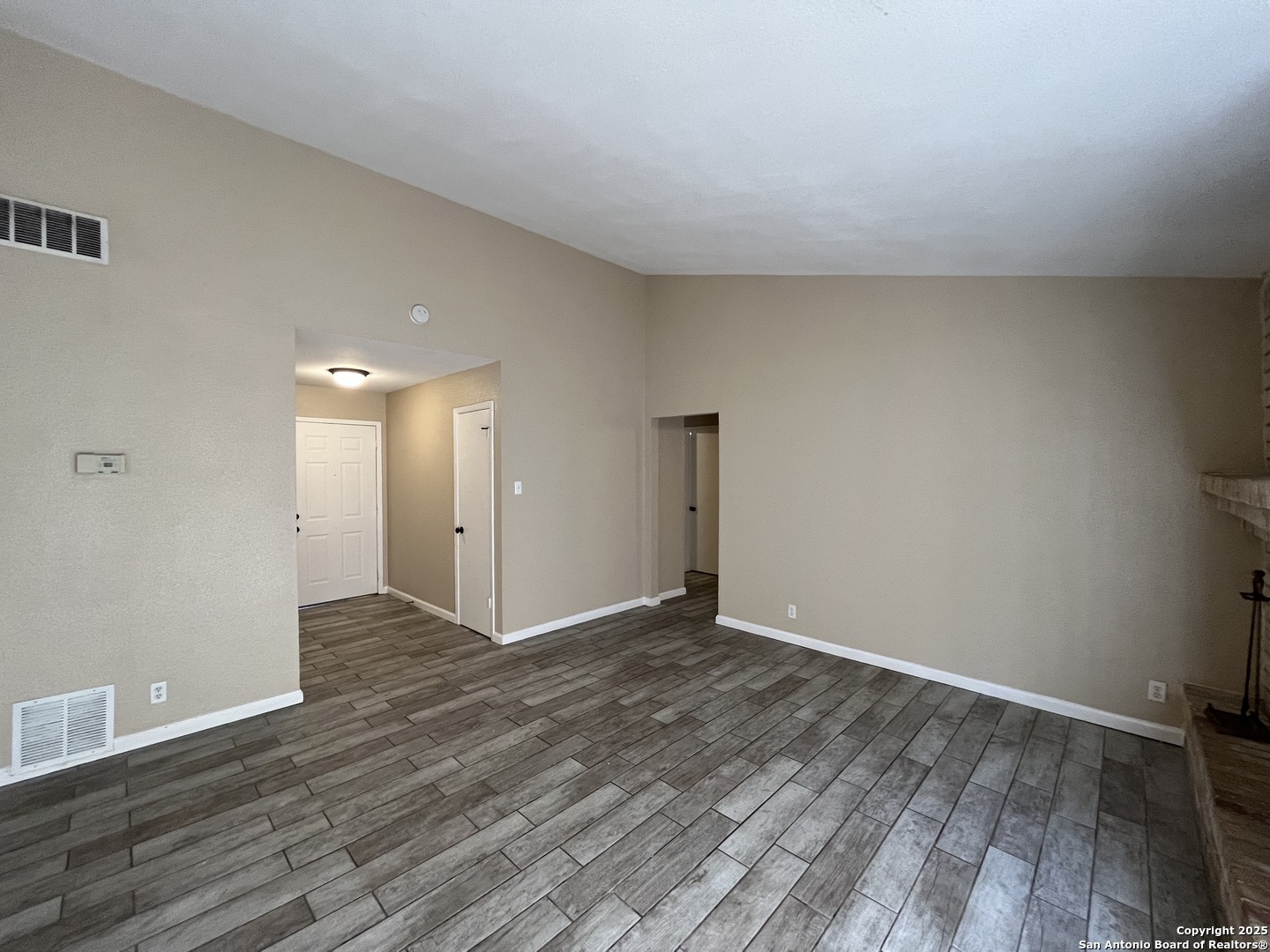 6522 Ridge Willow Drive San Antonio, TX 78233 - Photo 8 of 42 a view of an empty room with wooden floor
