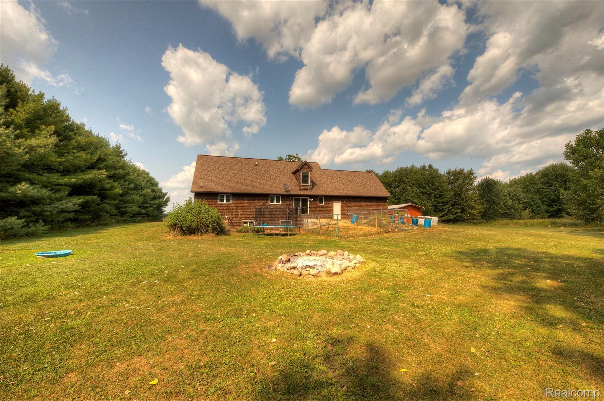 9103 Pierson Road Fowlerville, MI 48836 - Photo 32 of 35 back.jpg