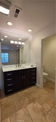 a view of a utility room with racks on the wall