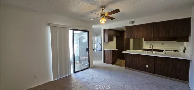 a kitchen with a cabinets and a sink