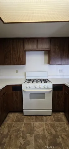 a view of a house with a yard and garage