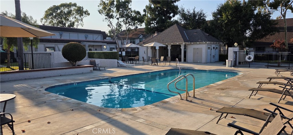4823 Cobblestone Lane, Unit 24 Cypress, CA 90630 - Photo 26 of 26 a view of a house with backyard and sitting area