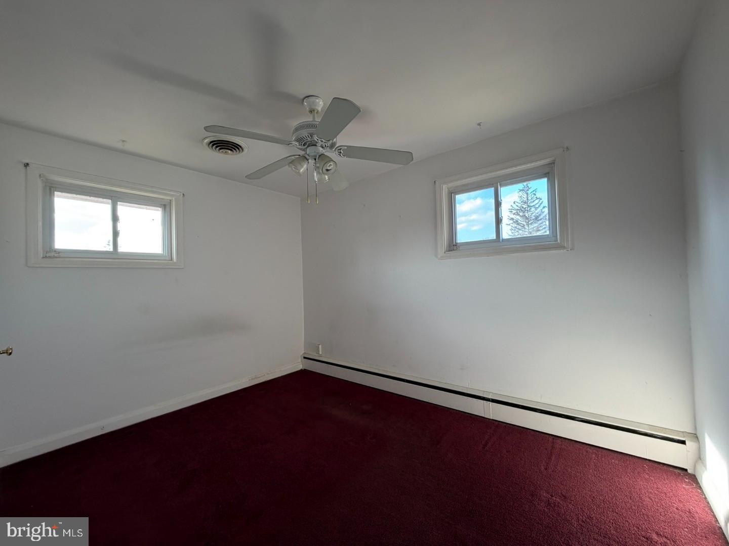 3829 Elmcroft Road Randallstown, MD 21133 - Photo 15 of 56 a view of an empty room with a window