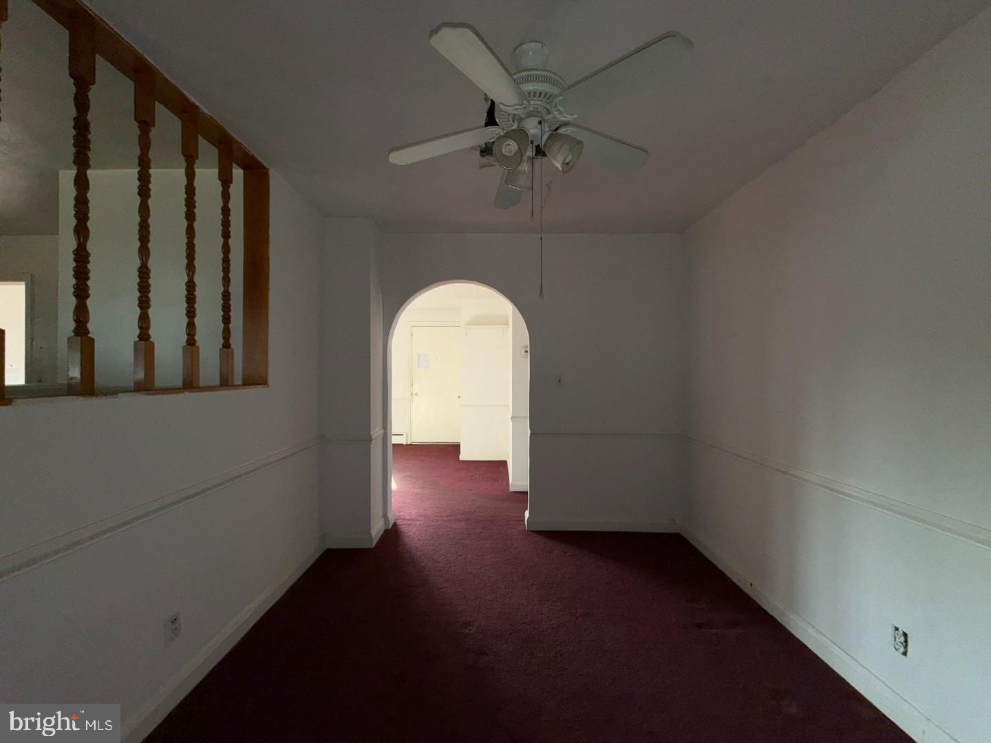 3829 Elmcroft Road Randallstown, MD 21133 - Photo 25 of 56 a view of a livingroom with a staircase