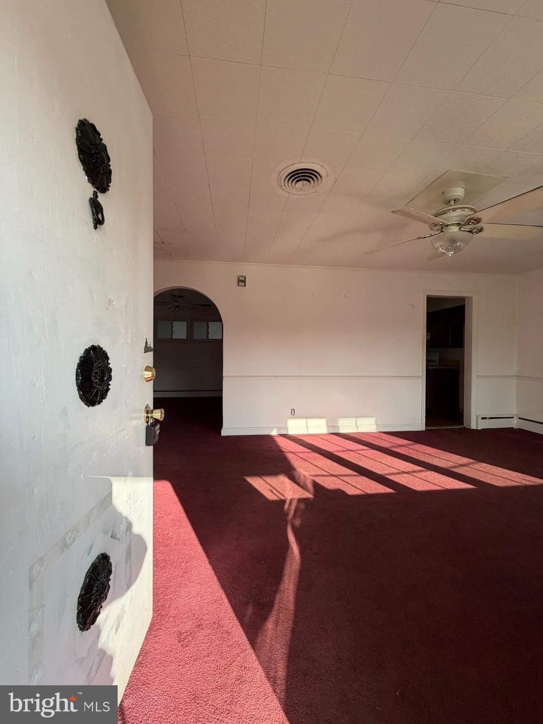 3829 Elmcroft Road Randallstown, MD 21133 - Photo 3 of 56 a bedroom with a bed and a window