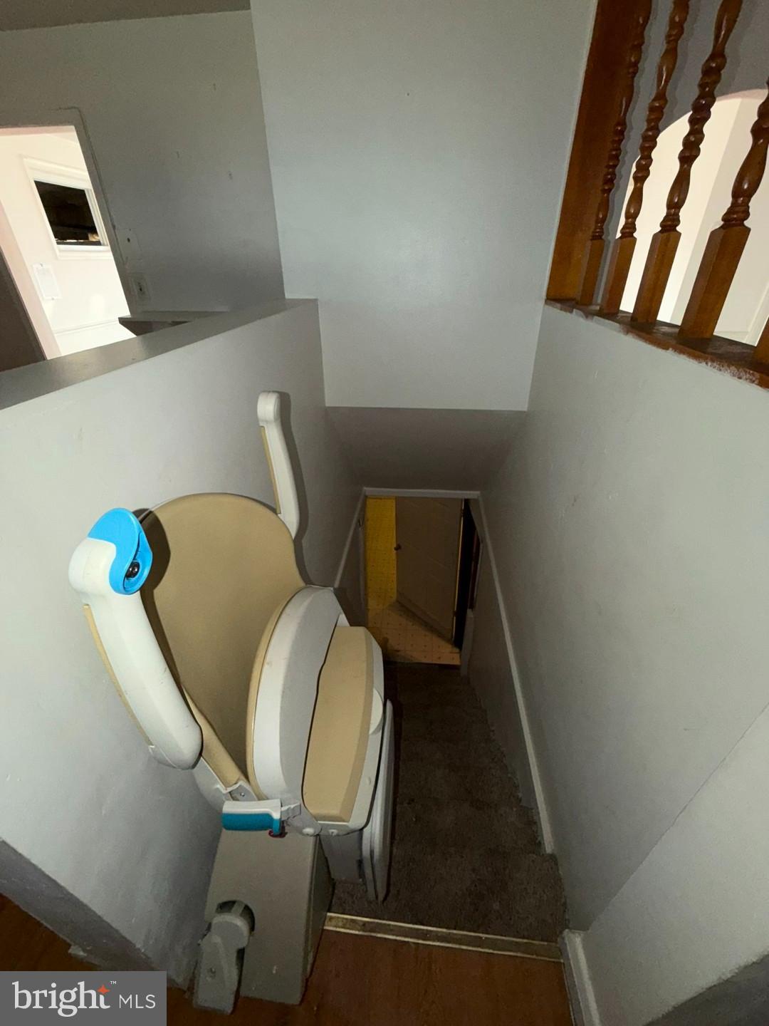 3829 Elmcroft Road Randallstown, MD 21133 - Photo 35 of 56 a bathroom with a toilet mirror and vanity