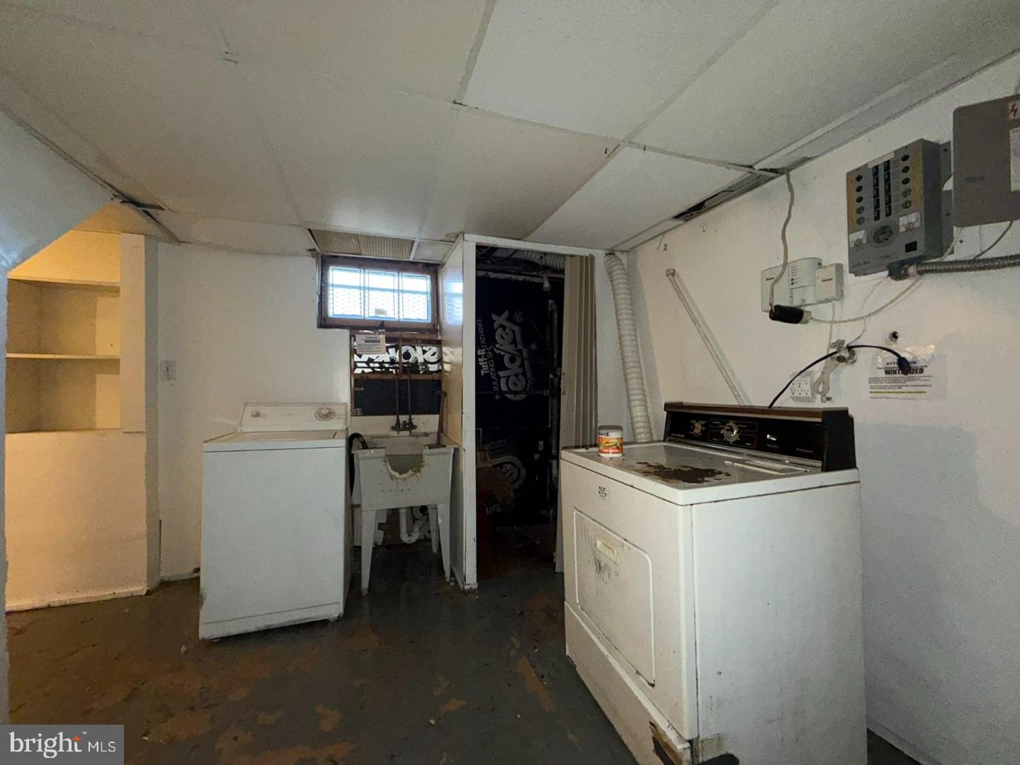 3829 Elmcroft Road Randallstown, MD 21133 - Photo 41 of 56 a kitchen with a refrigerator and a stove