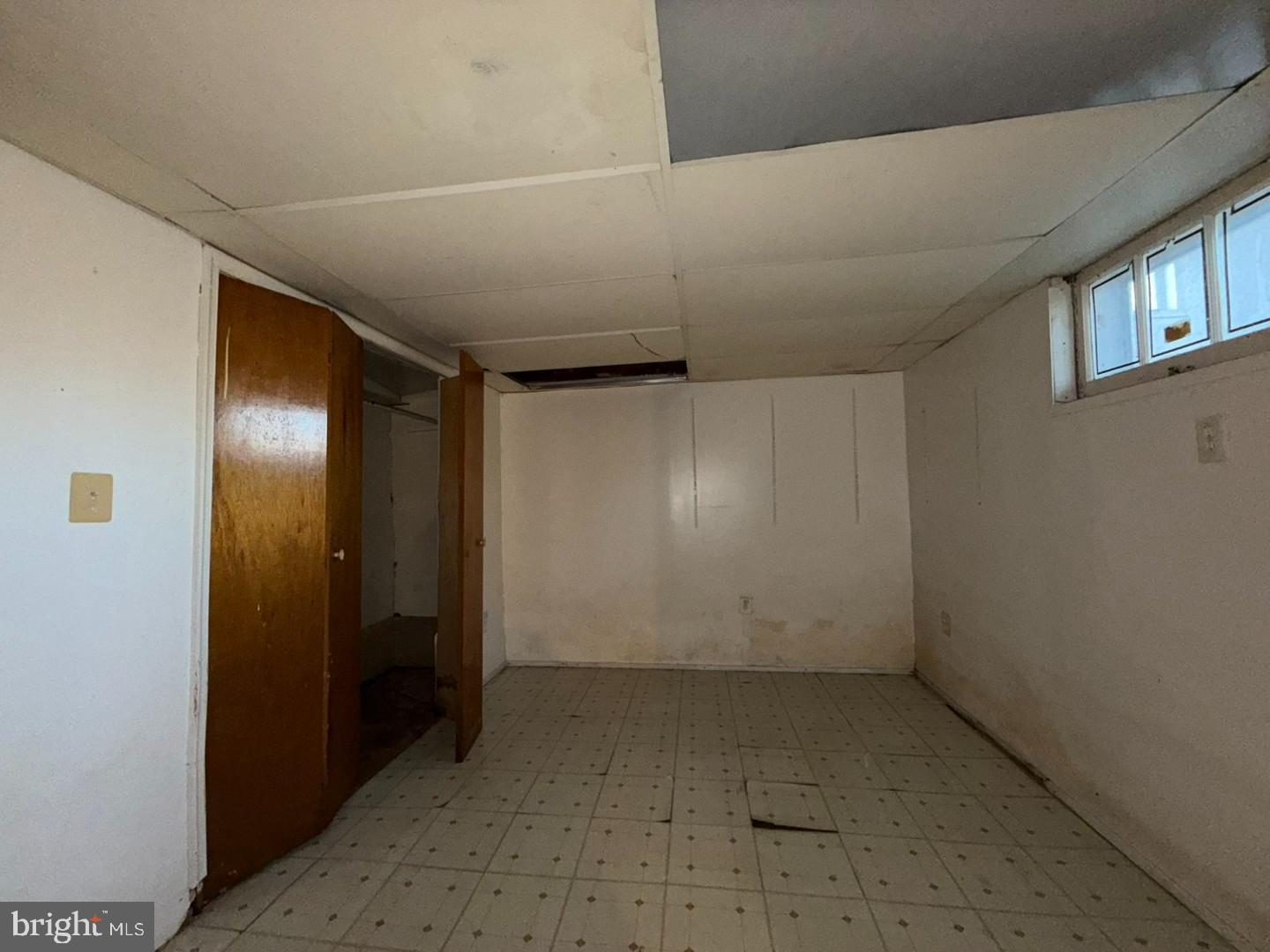 3829 Elmcroft Road Randallstown, MD 21133 - Photo 45 of 56 an empty room with windows