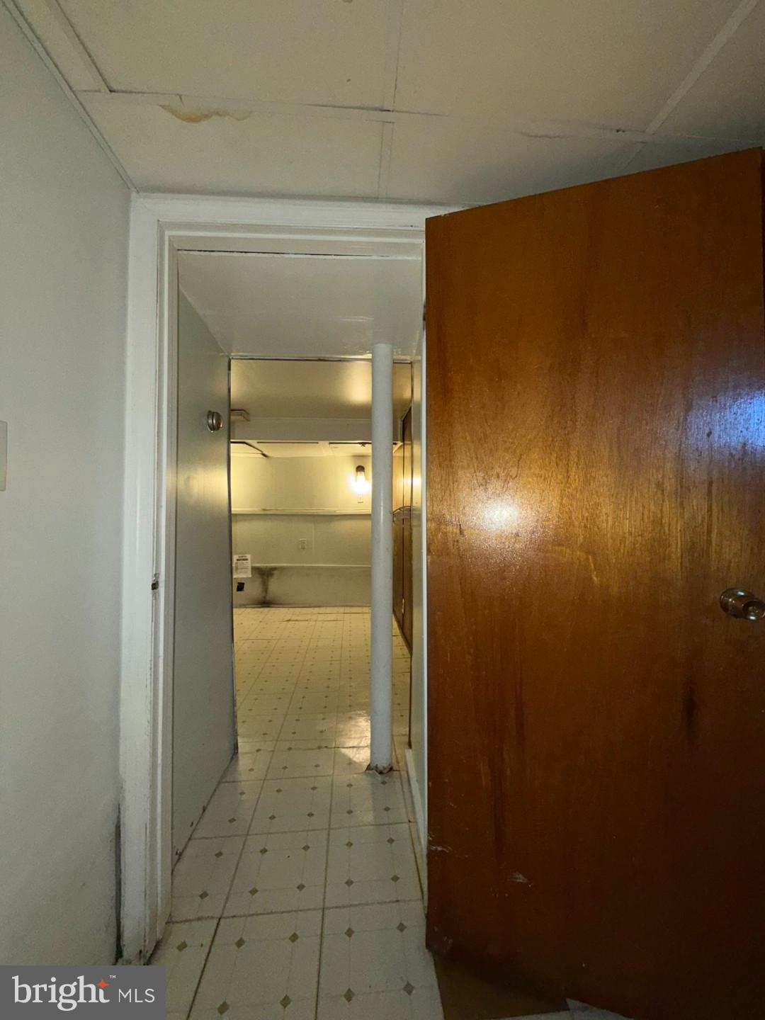 3829 Elmcroft Road Randallstown, MD 21133 - Photo 48 of 56 a bathroom with a glass door shower