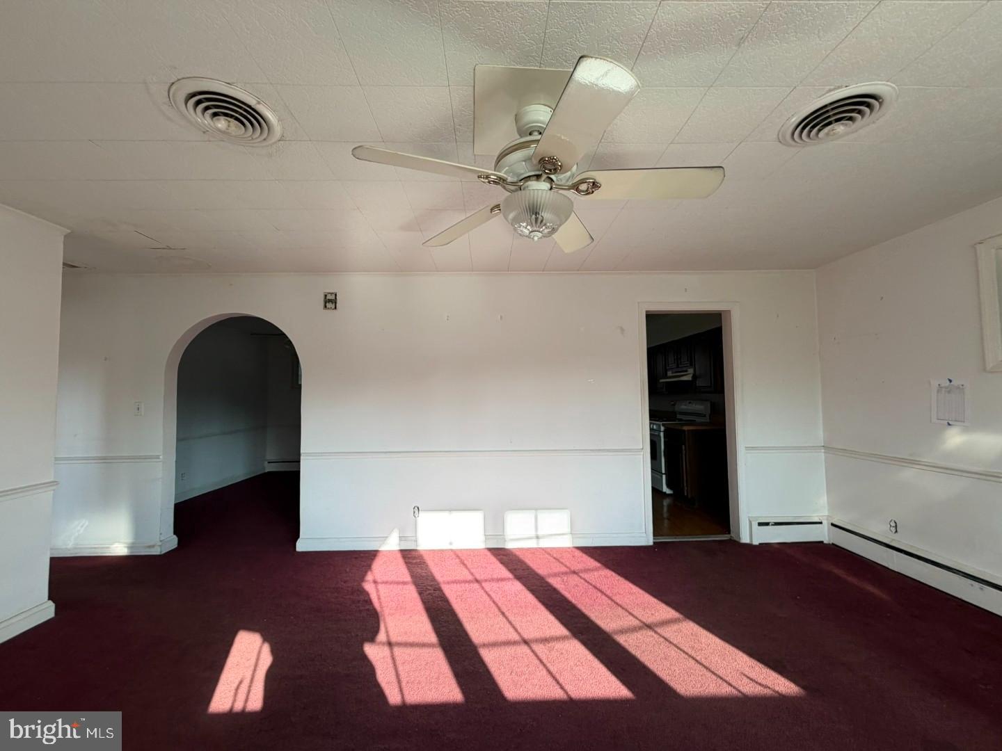 3829 Elmcroft Road Randallstown, MD 21133 - Photo 7 of 56 a bedroom with a bed and a chandelier