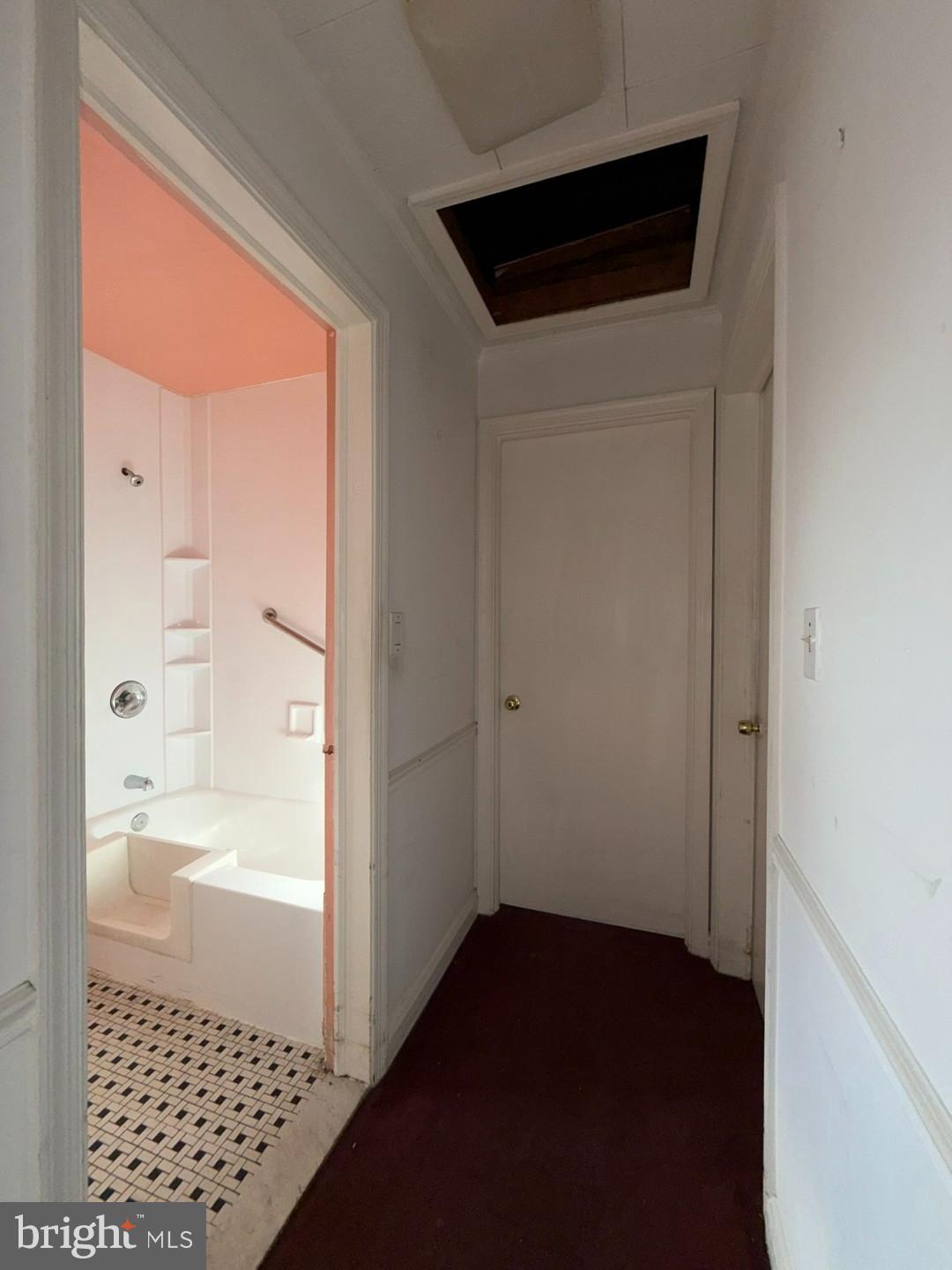 3829 Elmcroft Road Randallstown, MD 21133 - Photo 9 of 56 a bathroom with a bathtub and a shower