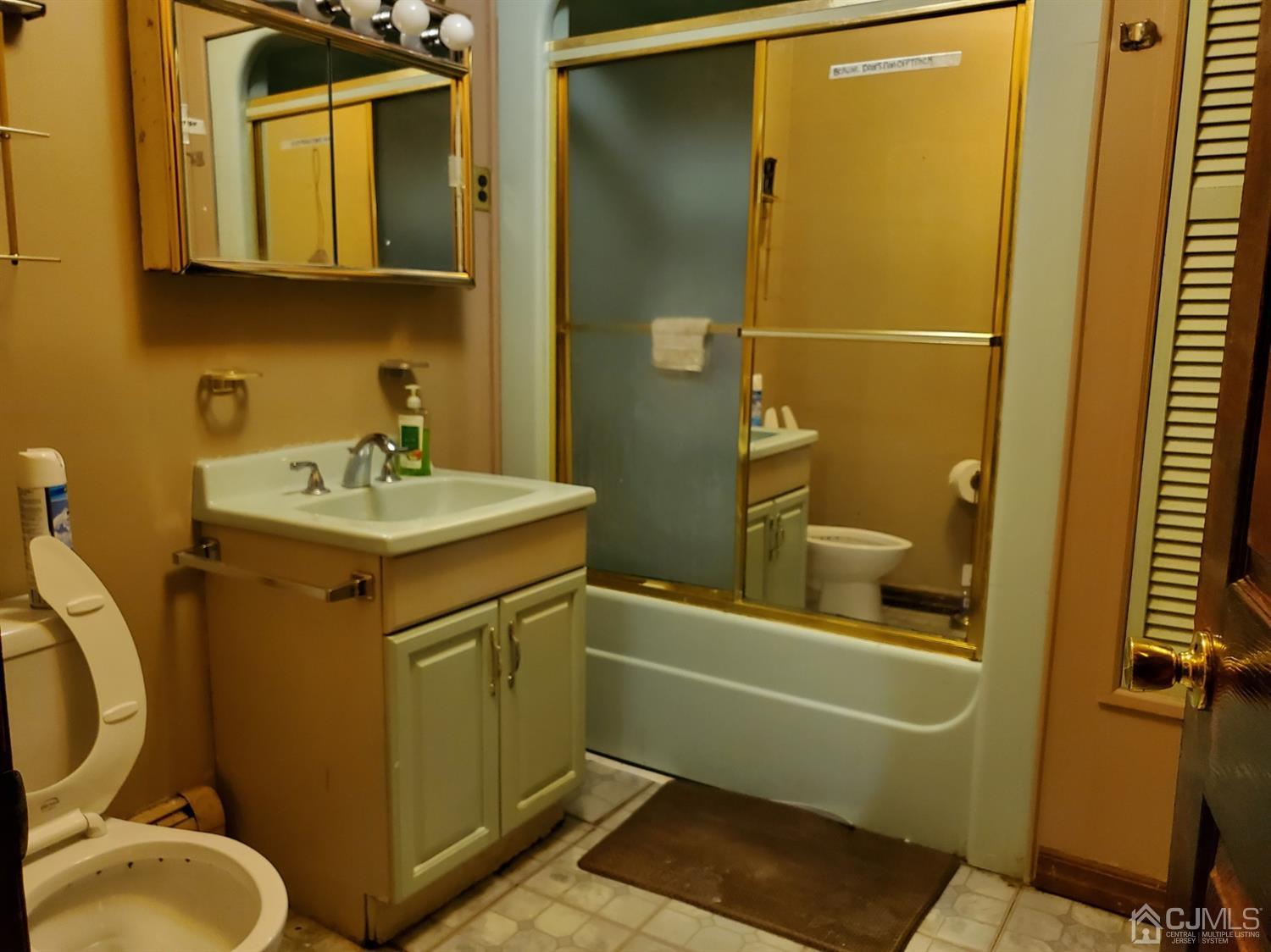 4 Mercury Road Edison, NJ 08817 - Photo 11 of 22 a bathroom with a sink toilet and shower