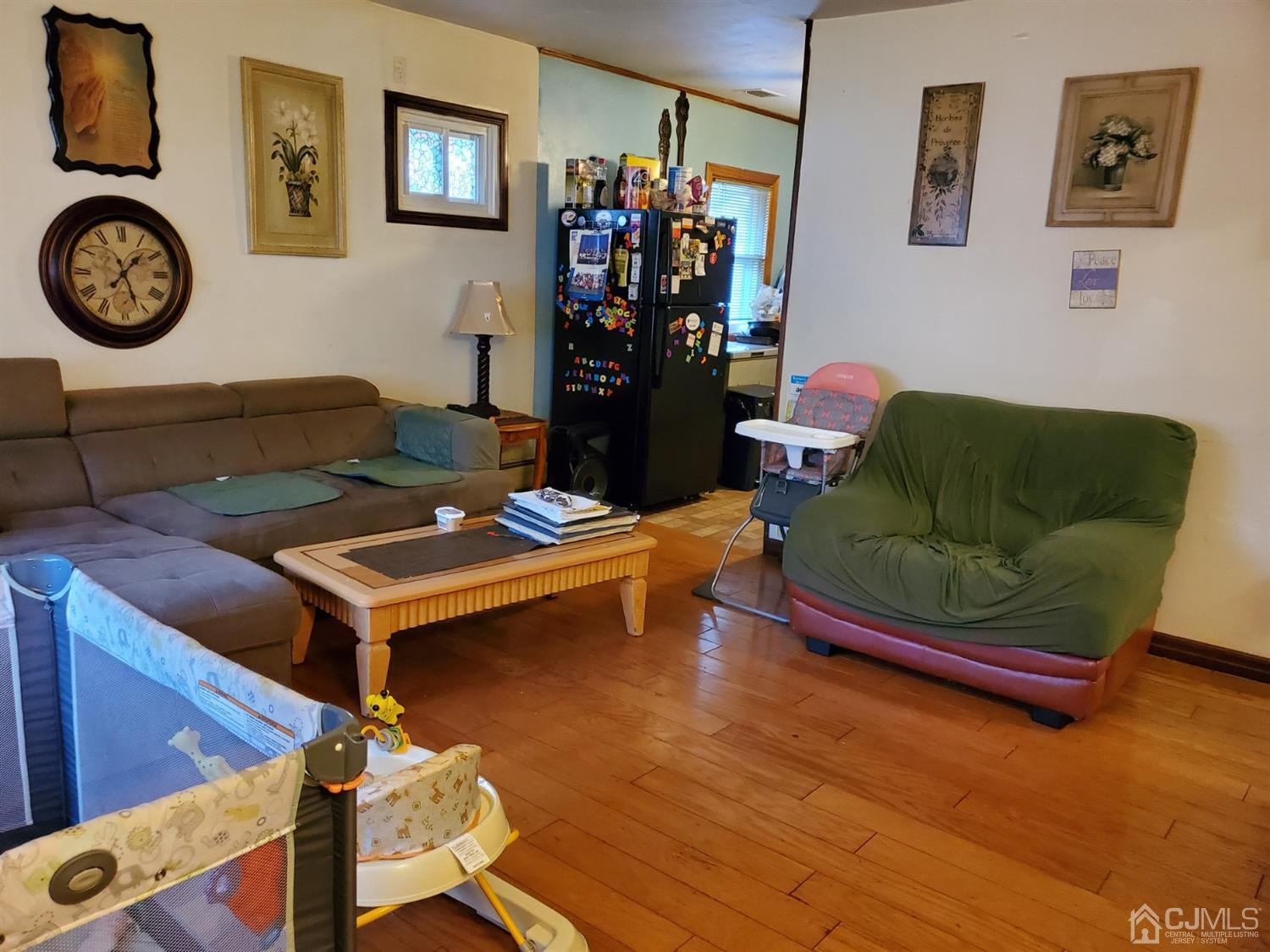 4 Mercury Road Edison, NJ 08817 - Photo 4 of 22 a living room with furniture and wooden floor