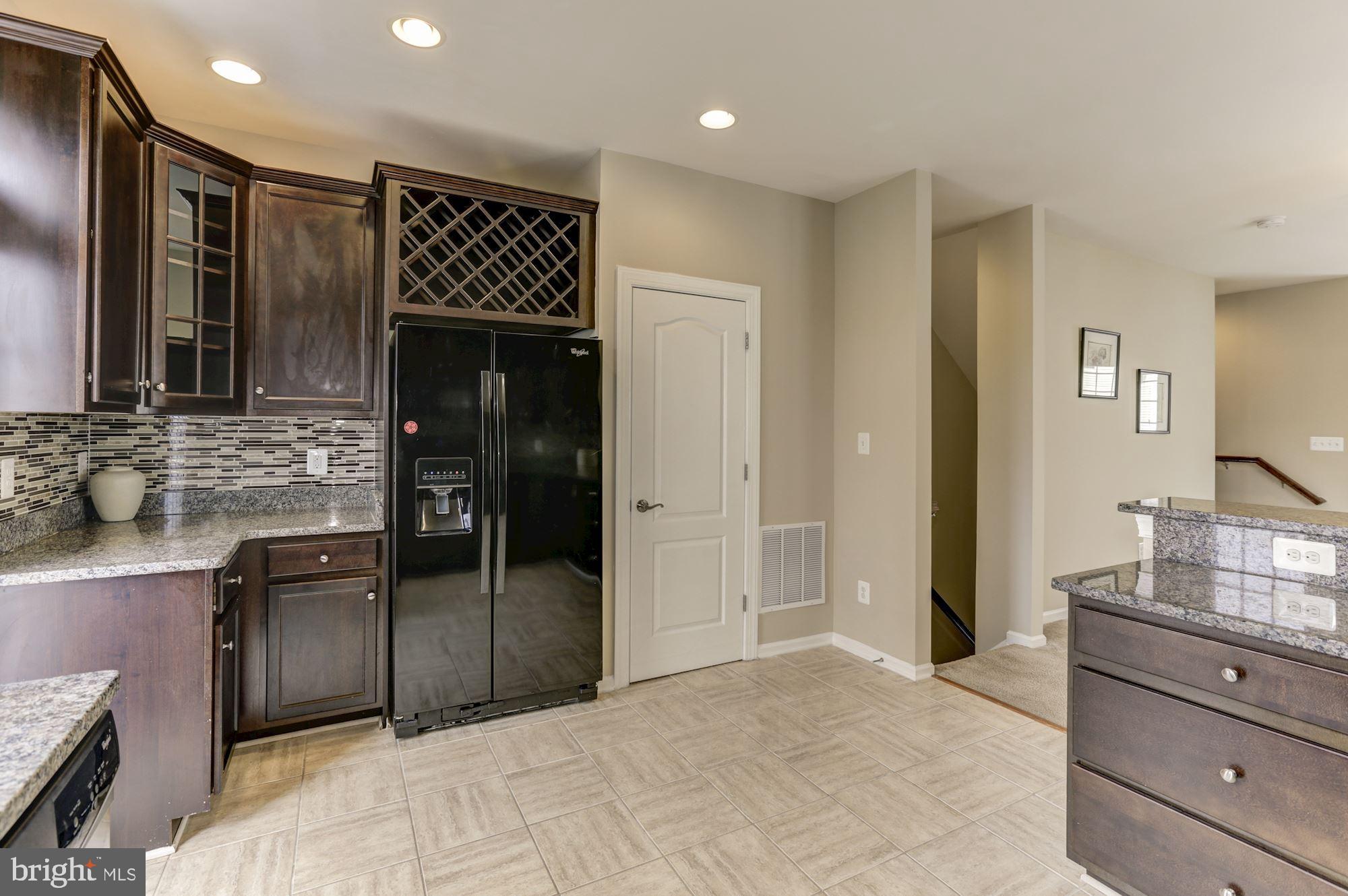 7478 Riding Meadow Way Manassas, VA 20111 - Photo 13 of 32 Ceramic tiles in the kitchen